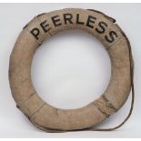 An early 20th century grey canvas and rope life preserver 'Peerless':, 70cm diameter.