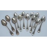 Five various Georgian Old English pattern table spoons,
