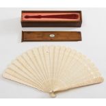 WITHDRAWN LOT 530 FS27
A late Regency period Chinese ivory brise fan: with central shield cartouche