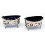 A pair of Edwardian pierced oval silver salts, maker George Nathan & Ridley Hayes, Chester 1907:,