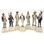 A group of seven Continental porcelain Napoleonic style military figures;