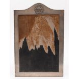 An Eastern white metal photograph frame with regimental crest:,