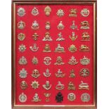 A collection of mostly modern Army badges: mounted and framed.