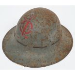 A World War II Fire Warden's steel helmet: painted grey with red stencilled logo, with liner,