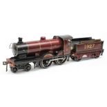 A Bassett-Lowke c/w locomotive No 1927 'Duke of York': with six wheel tender in LMS maroon livery,