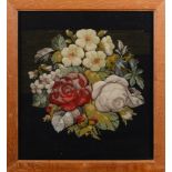 A Victorian raised wool work panel of flowers:,