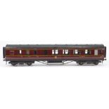 Exley, a 3rd/brake passenger corridor coach:, in LMS maroon livery.