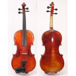 A viola by Roderick Paesold: the two piece back of broad flame and curl with a varnish of a mid to