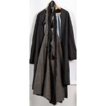 An early 20th century Japanese gentleman's black silk wedding Haori and Hakama:.