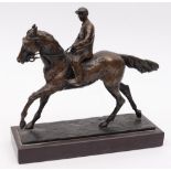 Catharni Stern (1925-2015)-
a bronze figure of a show jumper and rider:,