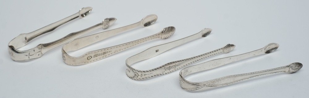 A pair of Georgian silver sugar tongs, maker W T,: initialled,