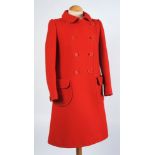 A 'Courreges' red overcoat:.