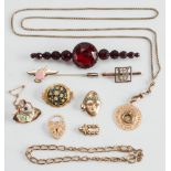 Three costume brooches/pins, three gold brooches, a gold curb-link bracelet, a gold fitting,