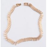 A 9ct gold fringe necklace:, approximately 55gms gross weight.