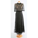 A Victorian black lace and jet beaded long dress together with a taffeta and black lace overlay