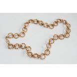 A 9ct gold necklace of rope twist, circular links:, 48gms gross weight.