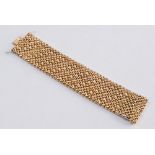 A heavy 18ct yellow gold mesh-link bracelet:, approximately 82gms gross weight.