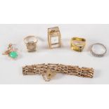 A 9ct gold gate-link bracelet, three gem set rings and two gold pendants:.