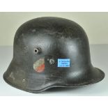 Wehrmacht Steel Helmet M31. Both emblems remain to around 80%, liner only fragmentary, chin strap