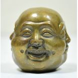 Four-face-head of different emotonally states. Brass, hollow made, chinese mark on the base.