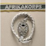 Set Wehrmachts insignias. 1.) Shooting-linyard, infantery, 2. model; 2.) cuff title "AFRIKAKORPS".