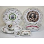 Seven parts of patriotic china. Three plates, two bowls and two cups. All with interesting