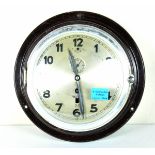 Kriegsmarine Kieninger ships-wall-clock. Brown bakelit body, metal top, cipher and ealge, M and