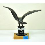 Patriotic desk decoration. Eagle with spread wings, blackened, further eagle attached to the base,