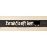 Hitler Youth cufftitle "Landdienst der HJ". Black band, white letters woven in. Condition: II