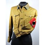 NSDAP: Service jacket of a leader of an Ortsgruppe. Brown SA-jacket, stamped in the collar 62221,