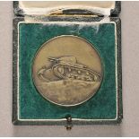 Medal of Armor Regiment 1, 1937, in case. Zinc brazed, in a dark green awarding case. Ø51mm.