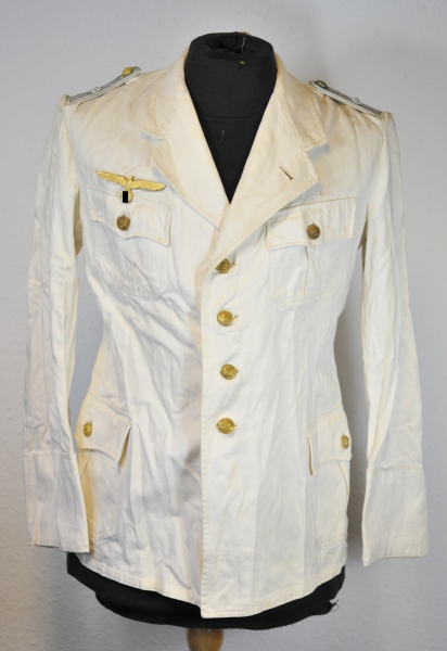 Kriegsmarine summer jacket of a Fähnrich. Fine white fabric, buttons and eagle fire gilded,