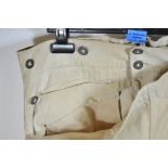 Wehrmacht: White Drillich trousers. White drillich fabric, red embroidered V in the band. Condition: