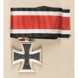 Knights Cross of the Iron Cross, 1957. Blackened core, silvered frame, on a long ribbon.