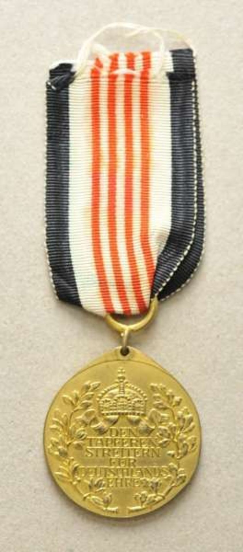 Opening: 50 EUR    0.1.) Collection Rick Lundström  Colonial votive medal.  Gilded, on ribbon. - Image 2 of 2