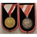 Österreich: Medaille in Gold und Silber für Verdienste um die Republik Österreich, im Etui.Vergoldet