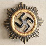 Deutsches Kreuz in Gold.Korpus Cupal, teilweise vergoldet, versilbert und emailliert,