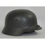 Wehrmacht Stahlhelm M 34.Schiefergrauer Lack, mit Innenfutter und Kinnriemen, die Glocke u.a.