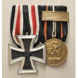 Kraus genähte Ordenschnalle mit zwei Auszeichnungen.1.) Eisernes Kreuz, 1939, 2. Klasse; 2.)