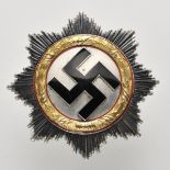 Deutsches Kreuz, in Gold.Cupal, teilweise vergoldet, patiniert und emailliert, mehrteilig gefertigt,