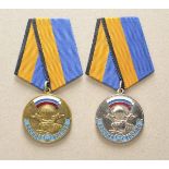 Russland: Medaille für die Einnahme des Flugplatzes von Pristina, 1. und 2. Klasse.Vergoldet bzw.