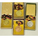 1.3.) Bundesrepublik Deutschland und DDRDDR: Vier Brieftauben-Medaillen, im Etui.Jeweils graviert,