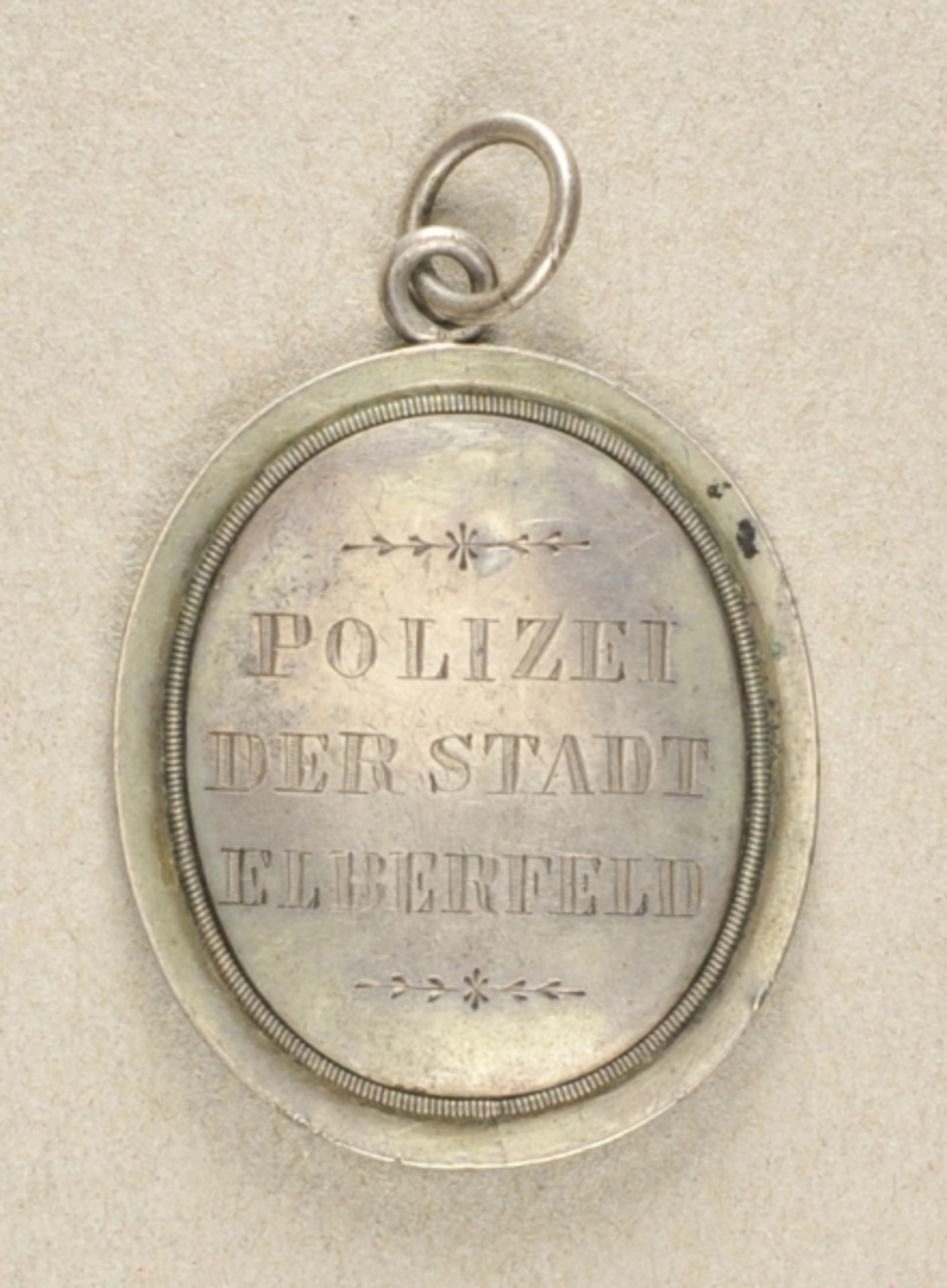 1.1.) Kaiserreich (bis 1933)Preussen: Polizeimarke der Stadt Elberfeld (Wuppertal).Silber, ovale