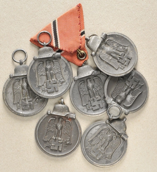 1.2.) Deutsches Reich (1933-45)Sieben Medaillen Winterschlacht im Osten.Teils mti Hersteller.