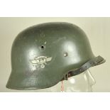 4.1.) Uniformen / KopfbedeckungenNSKK-Stahlhelm.Originale Glocke mit wohl neuem Abzeichen (NSKK/