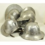 7.1.) HistoricaVier Mittelalter Helme.Jeweils Metallglock, teils mehrteilig, teils mit