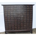 A 19th century Chinese apothecary chest, fitted one hundred and seventeen drawers, each with