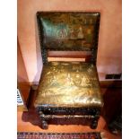 A Charles I oak chair, the rectangular open back and stuff over seat with close studded leather