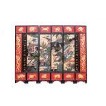 A Chinese carved coromandel lacquer six fold screen, the central four panels depicting courtly