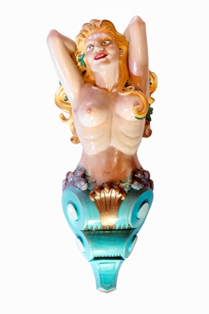 A 20th century carved wood and painted ship's figure head, in the form of a topless young woman with